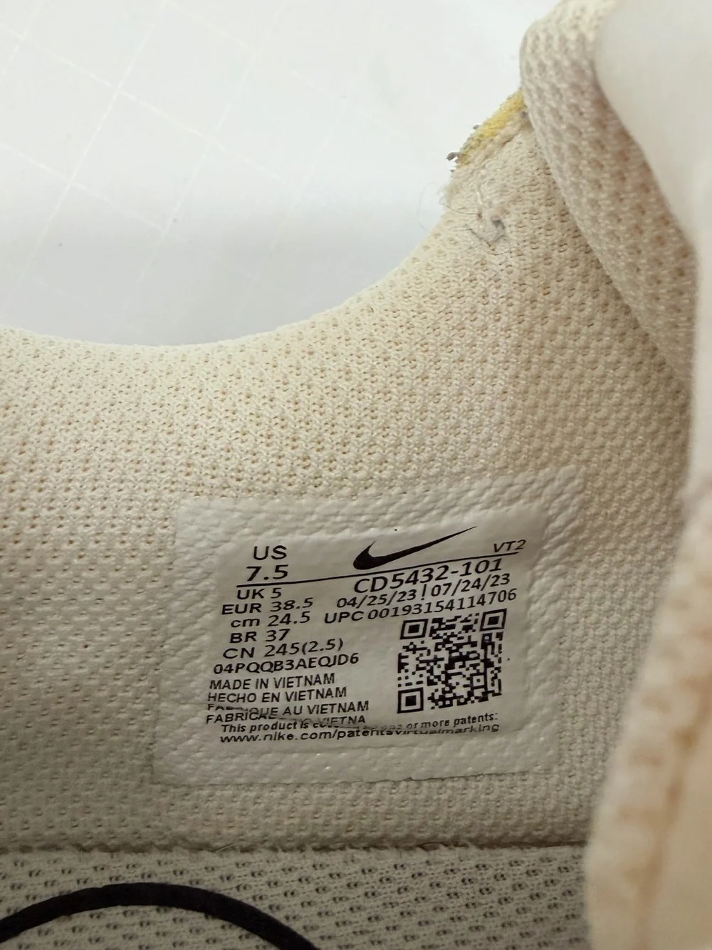 Nike White Sneakers with Black Swoosh